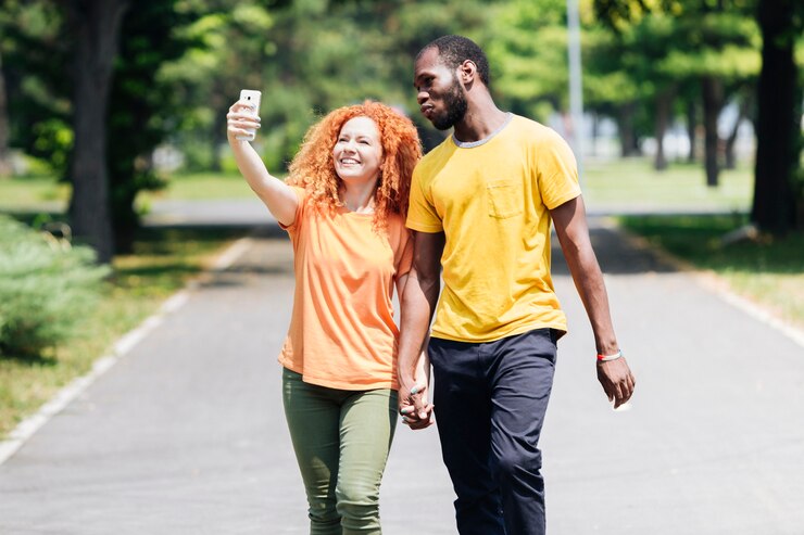 inter racial couple taking a walk