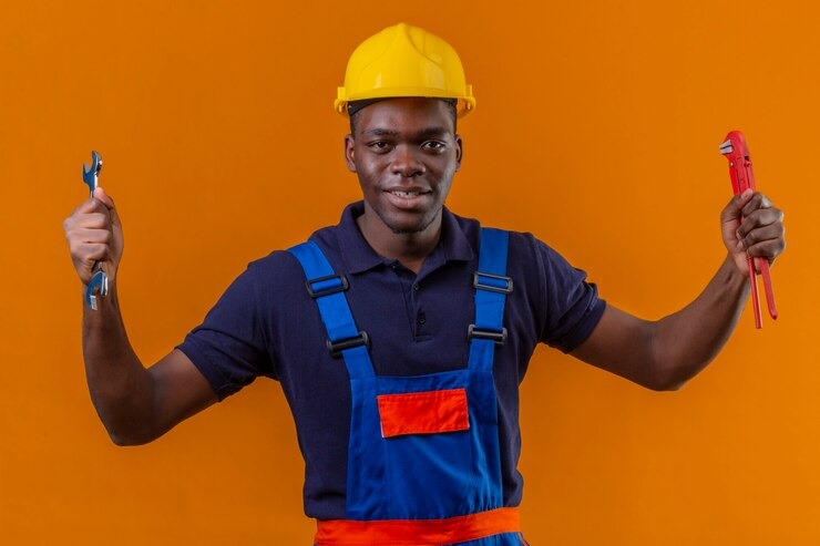 picture showing plumber with his tools