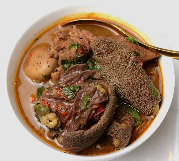 a bowl of pepper soup for a Nigerian Christmas