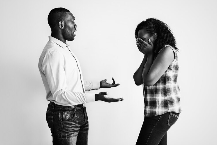 Picture showing a man and woman having a conversation about their childhood trauma