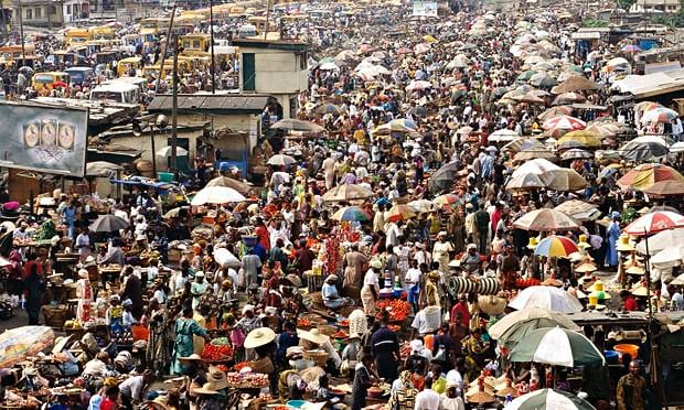 picture showing a crowd of busy shoppers hunting home decor in Alaba market