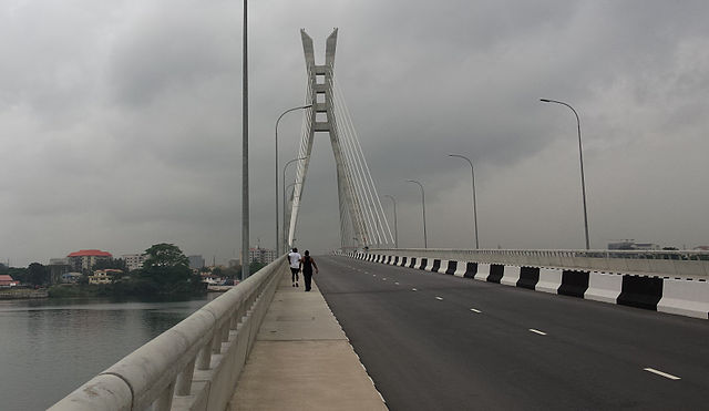 Picture showing couple taking a walk across the Lekki-Ikoyi link bridge in Lagos for cheap romantic date ideas