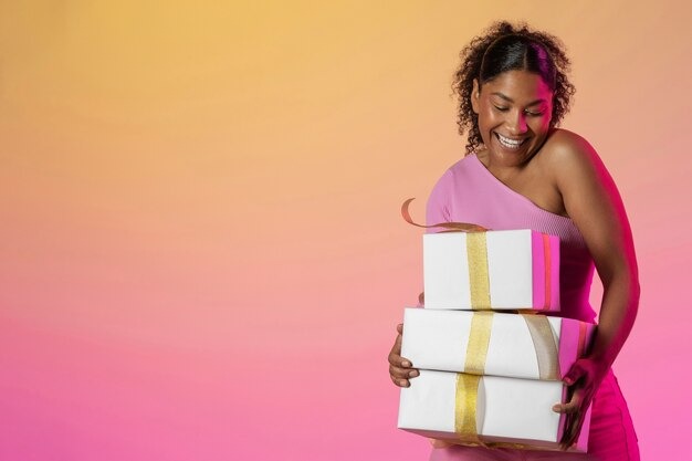 picture showing woman with gifts for rewarding herself after accomplishing her goals