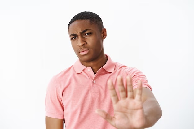 picture showing a young man saying no for his mental health