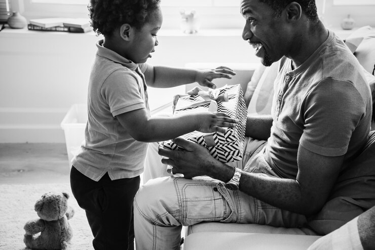 picture showing daddy getting a practical gift as a show of romance in parenting