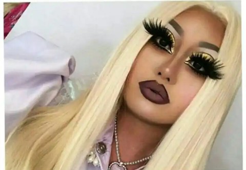 picture showing a fashionista rocking unnecessarily long lashes