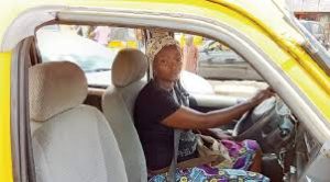 picture showing a female commercial bus driver as one of the unusual careers women are thriving in