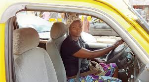 picture showing a female commercial bus driver as one of the unusual careers women are thriving in